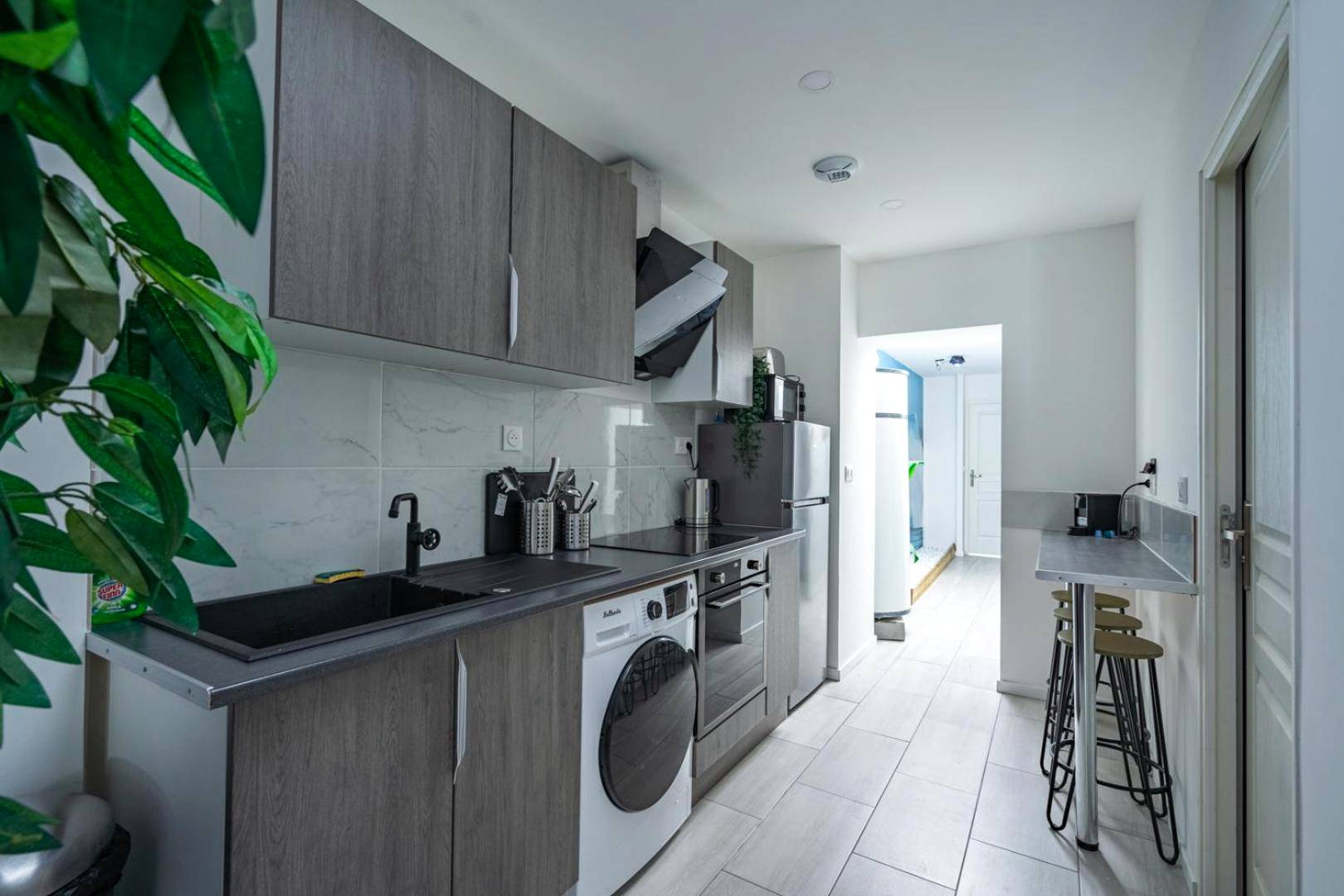 Photo du logement - Capsule océan - Jacuzzi - Billard - Netflix - 2 Chambres - Cuisine