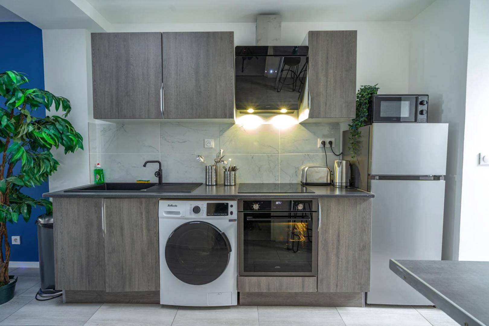Photo du logement - Capsule océan - Jacuzzi - Billard - Netflix - 2 Chambres - Cuisine