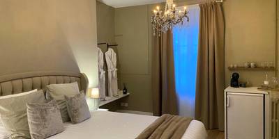 Vue du logement - UN COCON EN VILLE - chambre SPA chic et élégante