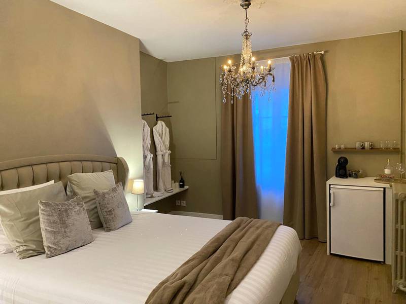 Vue du logement - UN COCON EN VILLE - chambre SPA chic et élégante