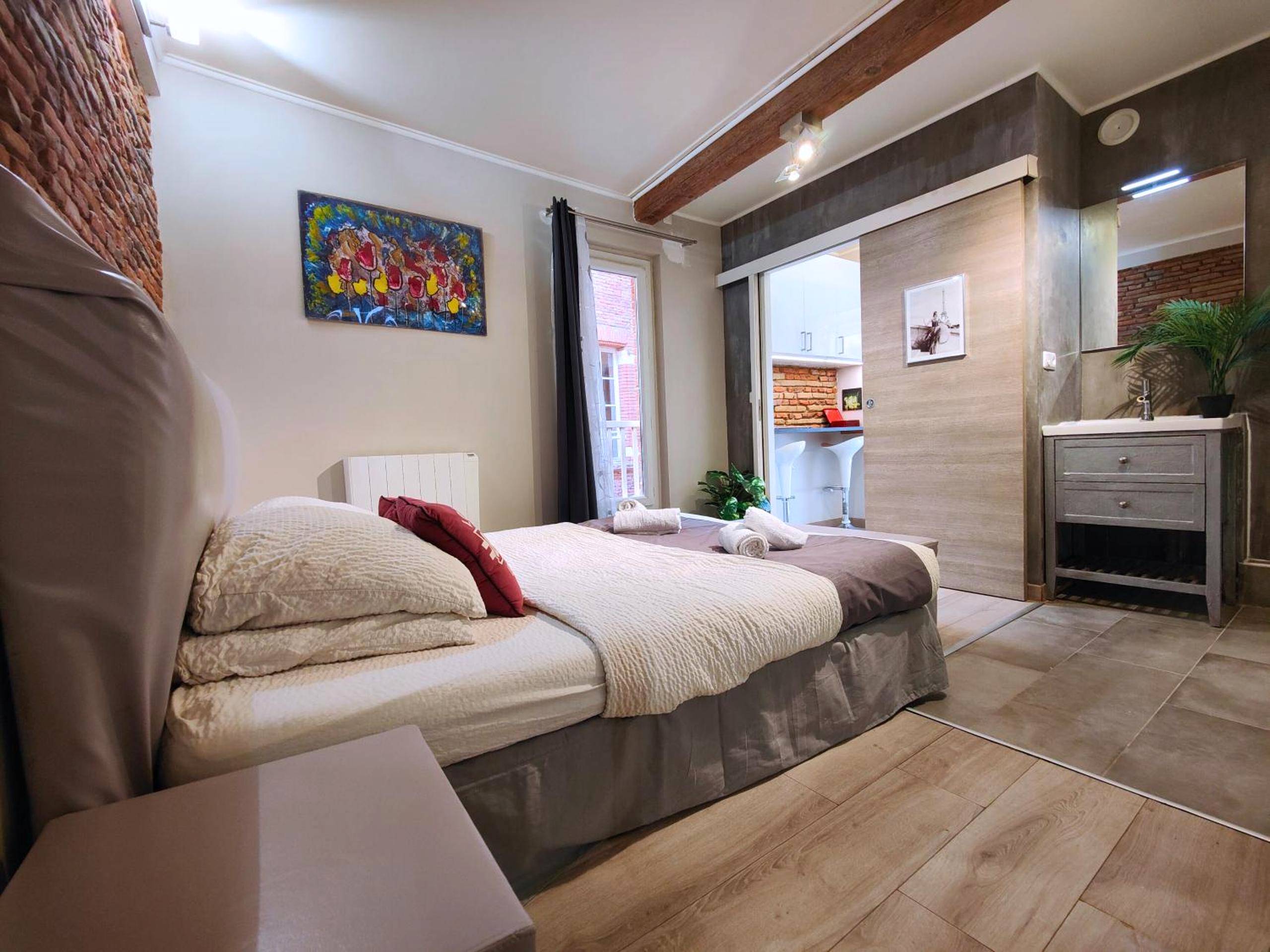 Suite avec lit king size et jacuzzi privatif - Cocoon'Inn Daurade