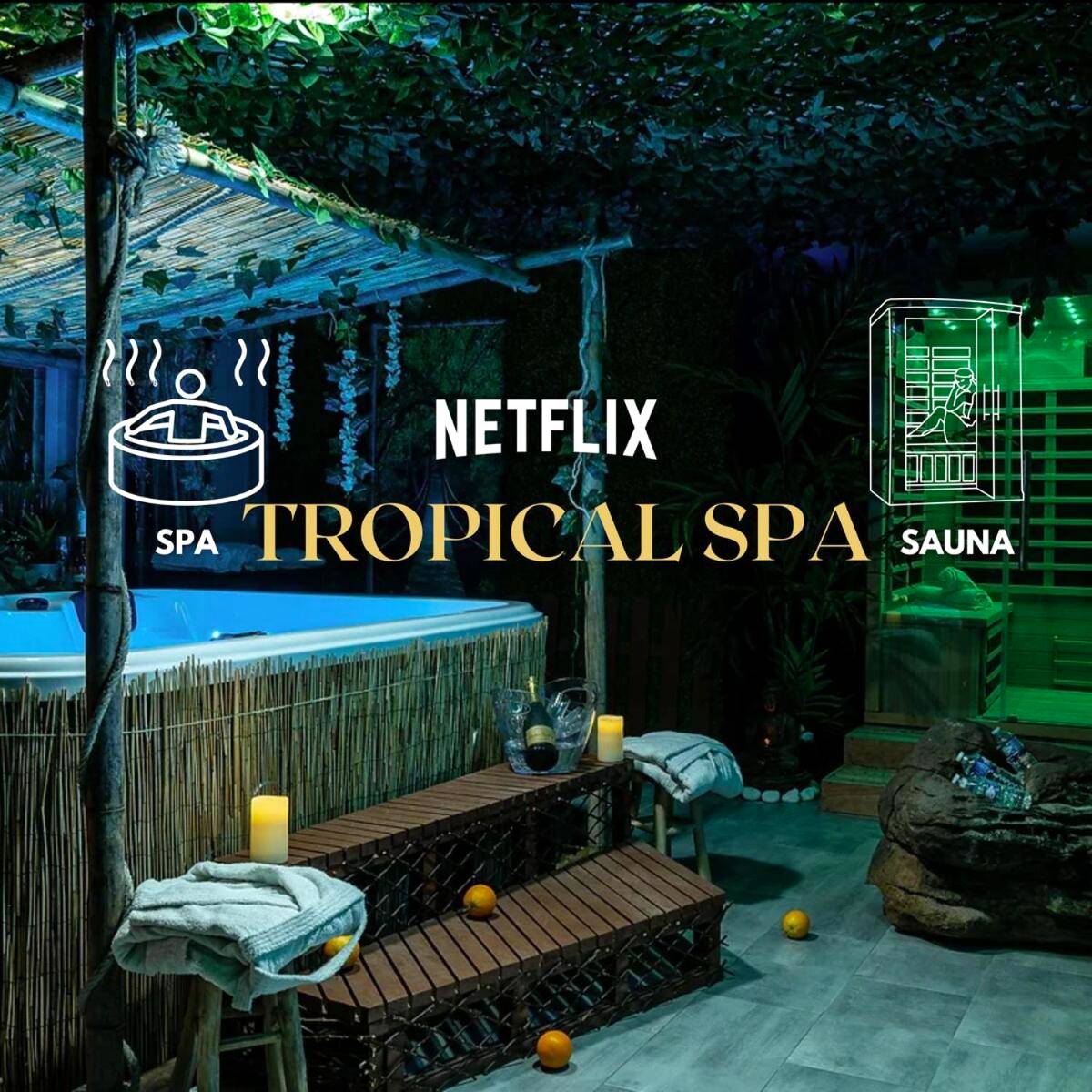 Espace spa tropical avec jacuzzi et sauna - Love Room Lizy - sur - Ourcq - Coquéo Spa & Sauna Suite Paris Disneyland