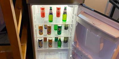 Réfrigérateur garni de boissons fraîches - Le Cosily jacuzzi et sauna privatif