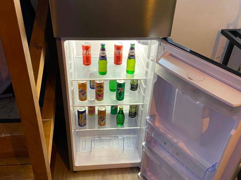 Réfrigérateur garni de boissons fraîches - Le Cosily jacuzzi et sauna privatif