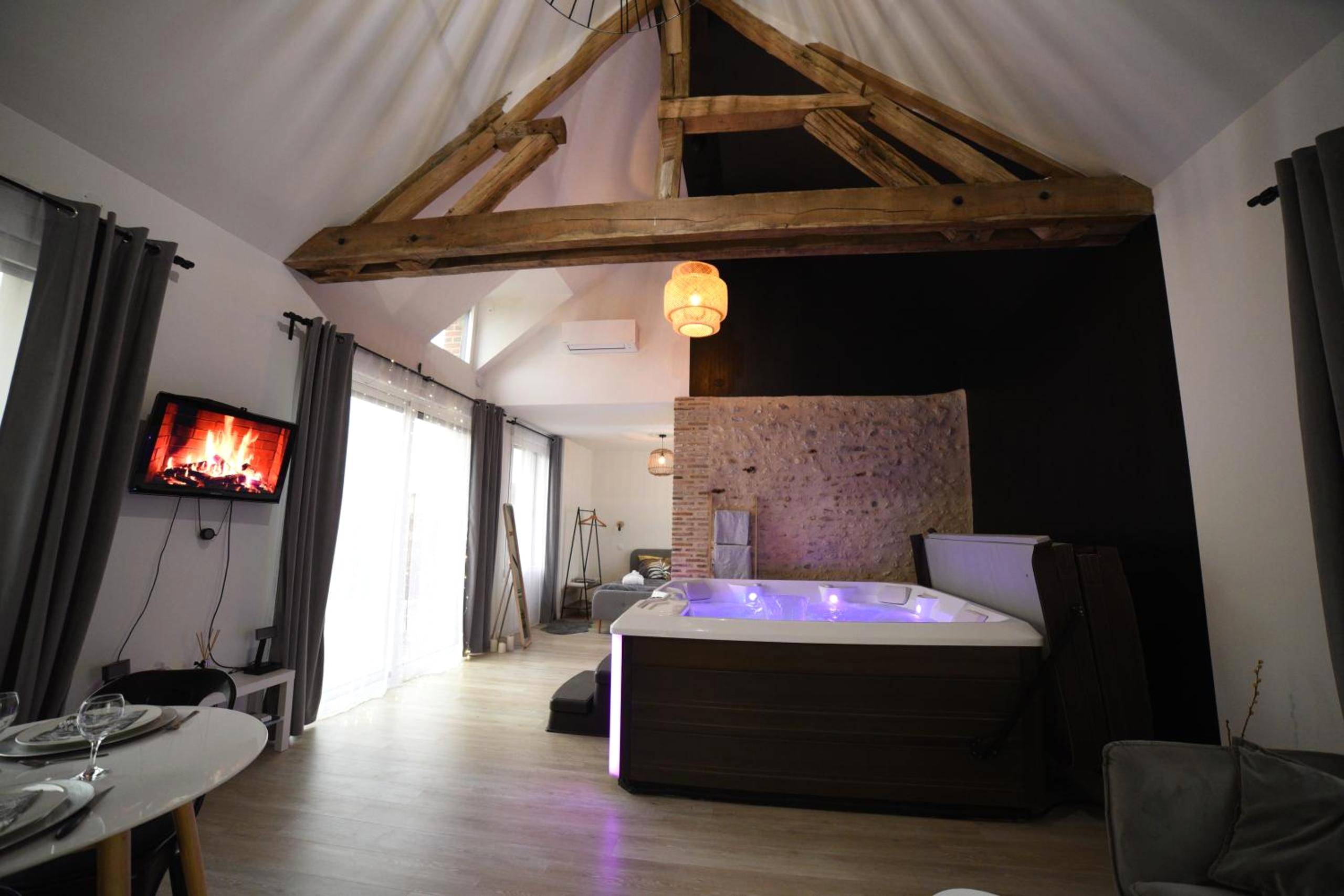Vue interieure - Eaudyssée maison avec SPA privée - Loiret