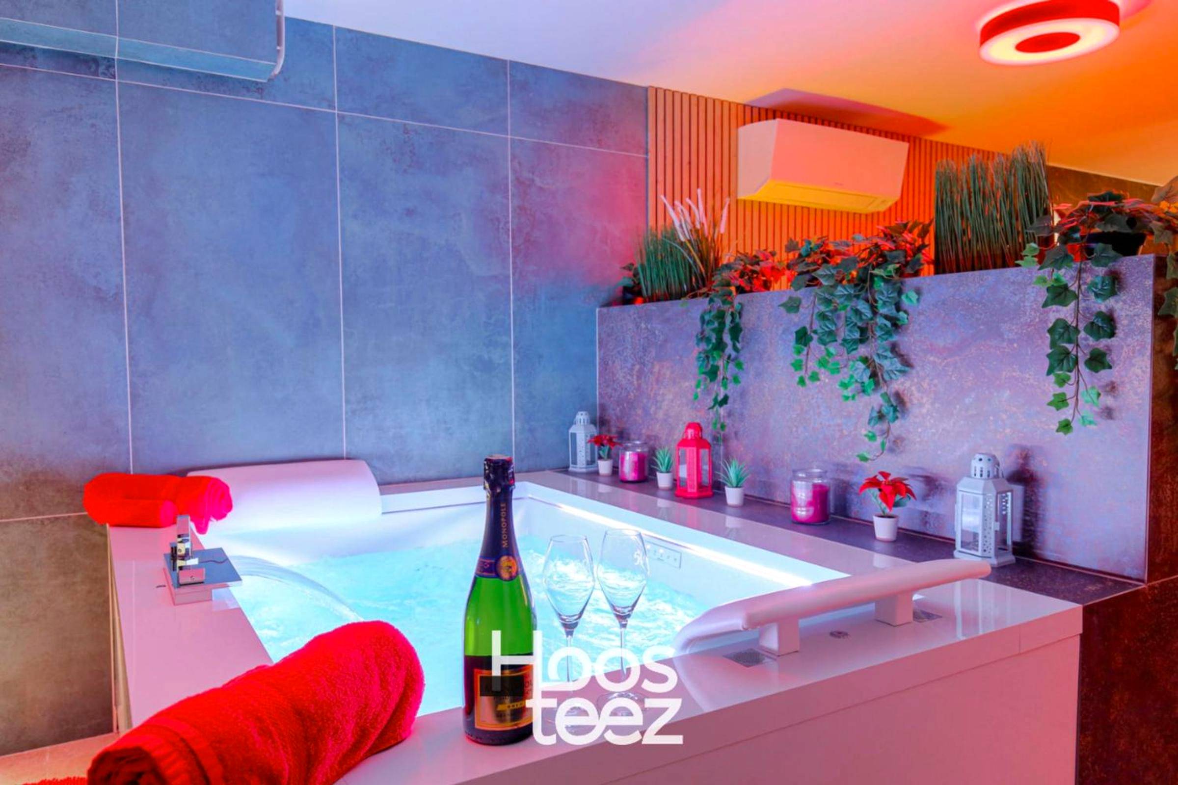 Baignoire balnéo avec bouteille et verres - Expérience des sens