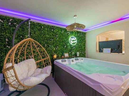 Jacuzzi privatif et fauteuil suspendu - L'instant Bornéo Superbe appartement avec jacuzzi