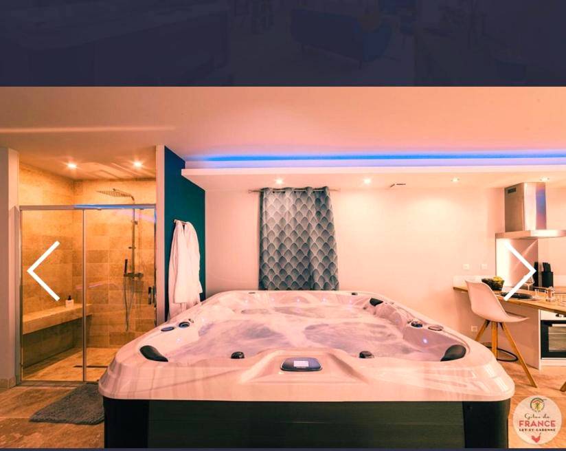 Jacuzzi privatif et douche à l'italienne - Love Room Saint - Maurin - Le loft en bulles