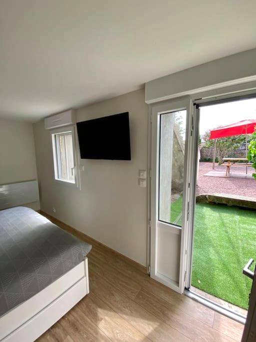 Chambre avec accès direct sur jardin privatif - LOFT Jardin et Spa