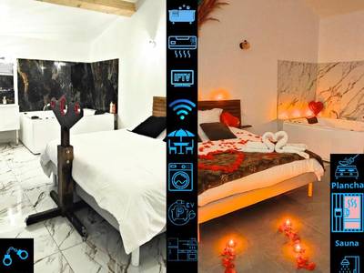 Espace nuit avec croix de Saint - André et jacuzzi - Maisons Plaisir & Pulsion Spa Sauna Privé