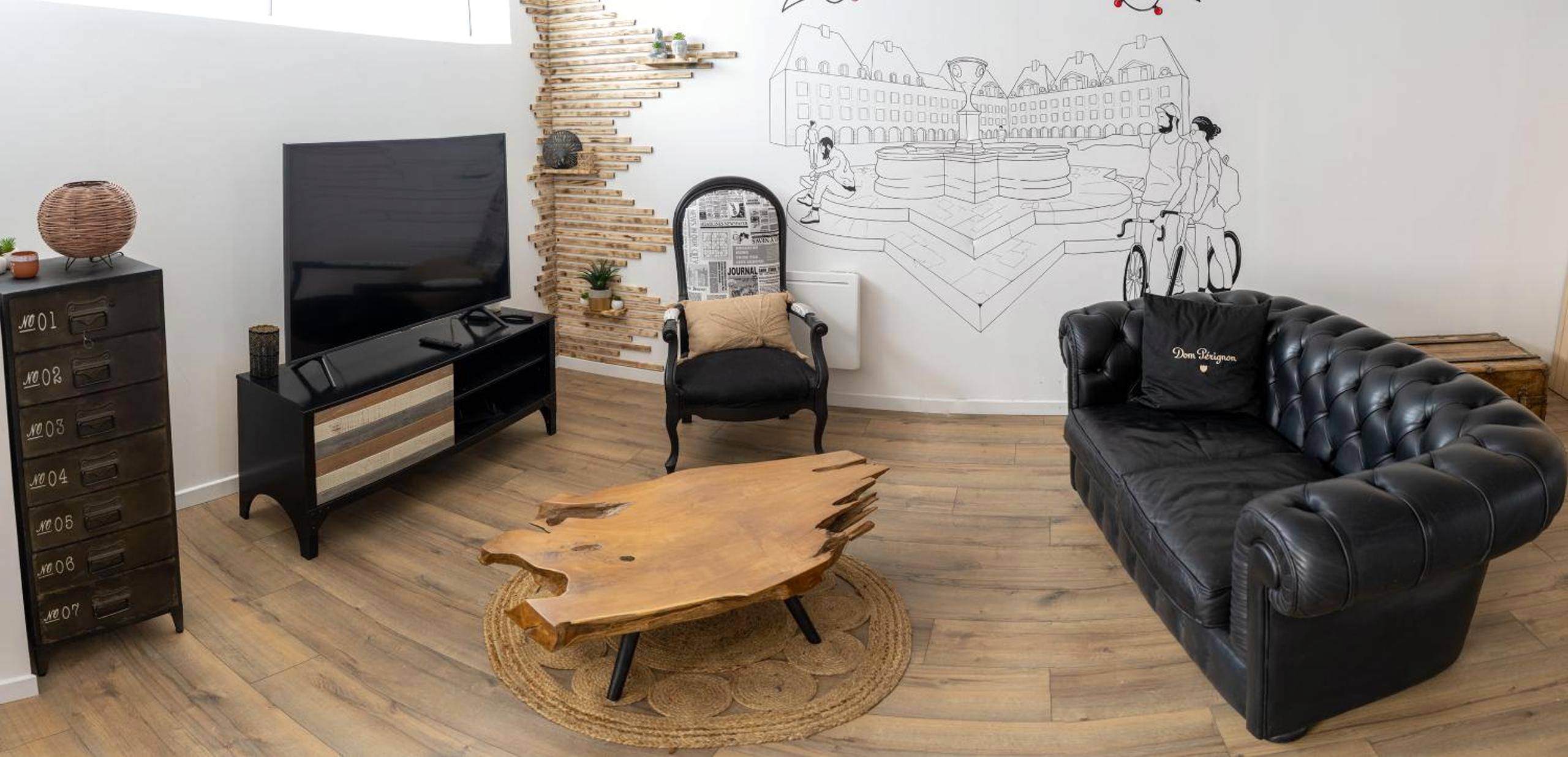 Salon avec canapé Chesterfield et table en bois - UNE PARENTHESE ARDENNAISE