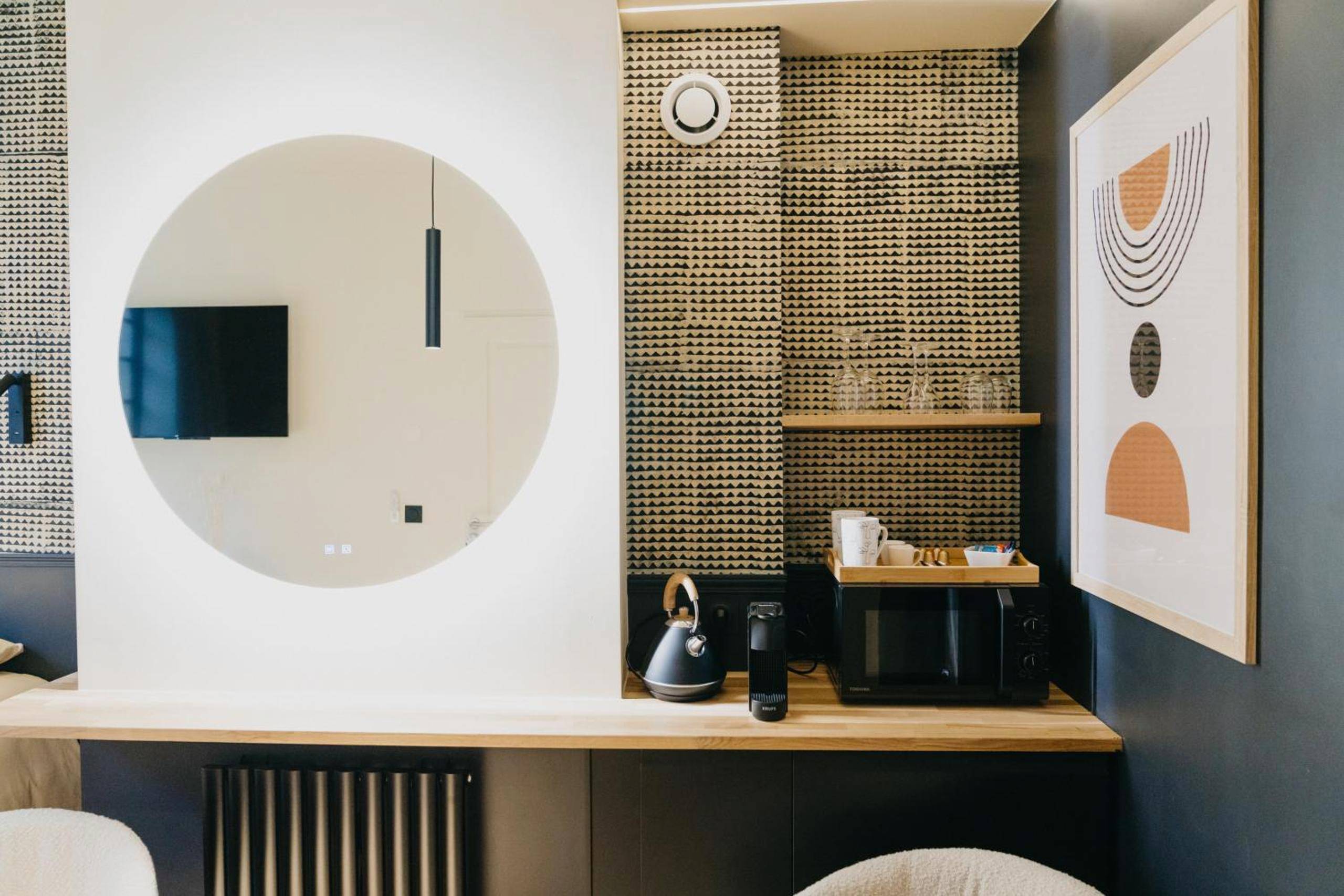 Coin cuisine équipé avec miroir rond - Paus à Metz