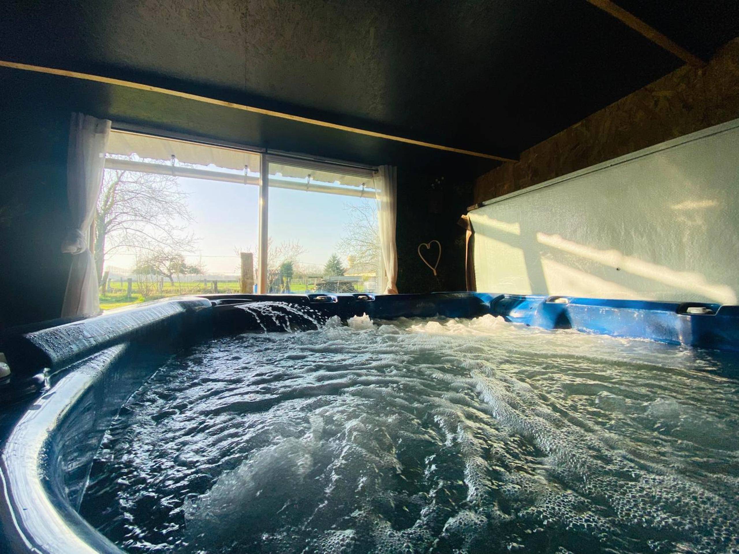 Photo du logement - Chambre avec spa privé