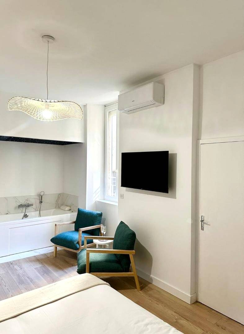 Photo du logement - Le SPA Étoilé - Baignoire Balnéo et Sauna Privatif