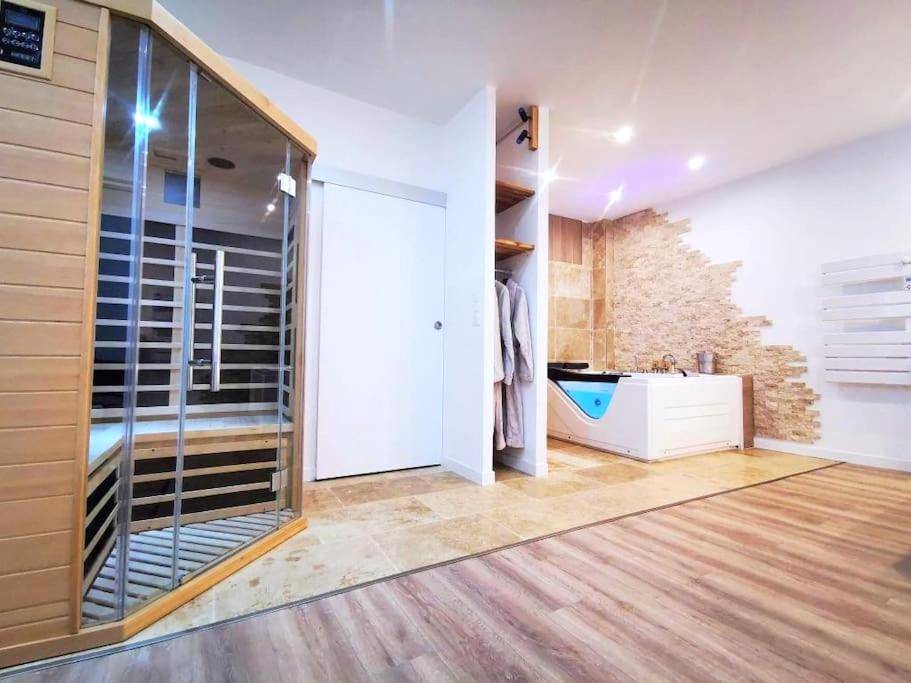 Espace bien - être avec sauna et jacuzzi - Le Temple du SPA