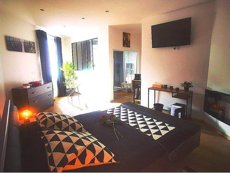 Photo du logement - le tricosy jacuzzi et sauna privatif