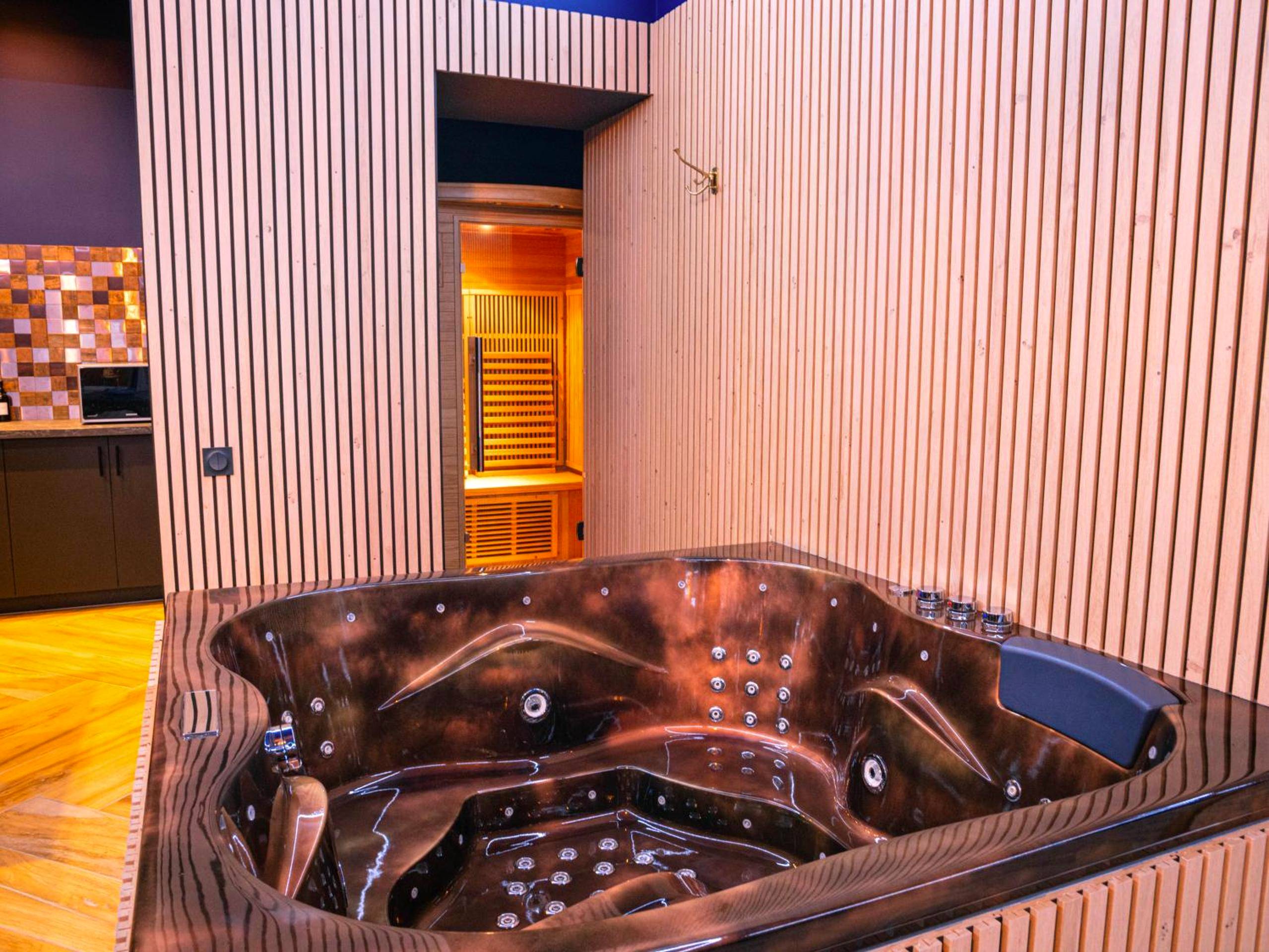 Photo du logement - Le Voluptueux - Sauna - Jacuzzi - Centre - Ville